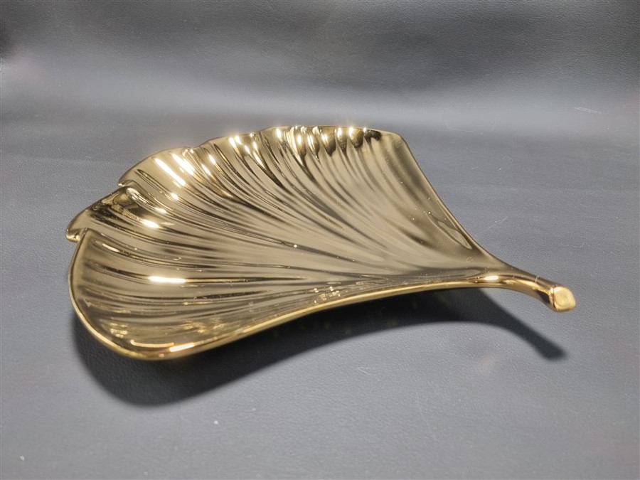 vide poche en forme de feuille de style art deco