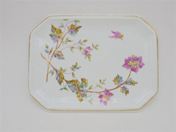 ancien petit plat en ceramique au decor floral colore vide poche