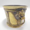 mortier en bronze tetes de lion