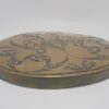 dessous de plat en bois recouvert de laiton decor esprit oriental ou art nouveau