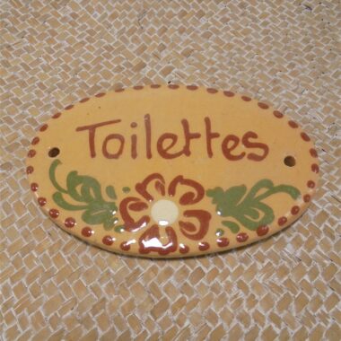 Plaque en terre cuite "toilettes"